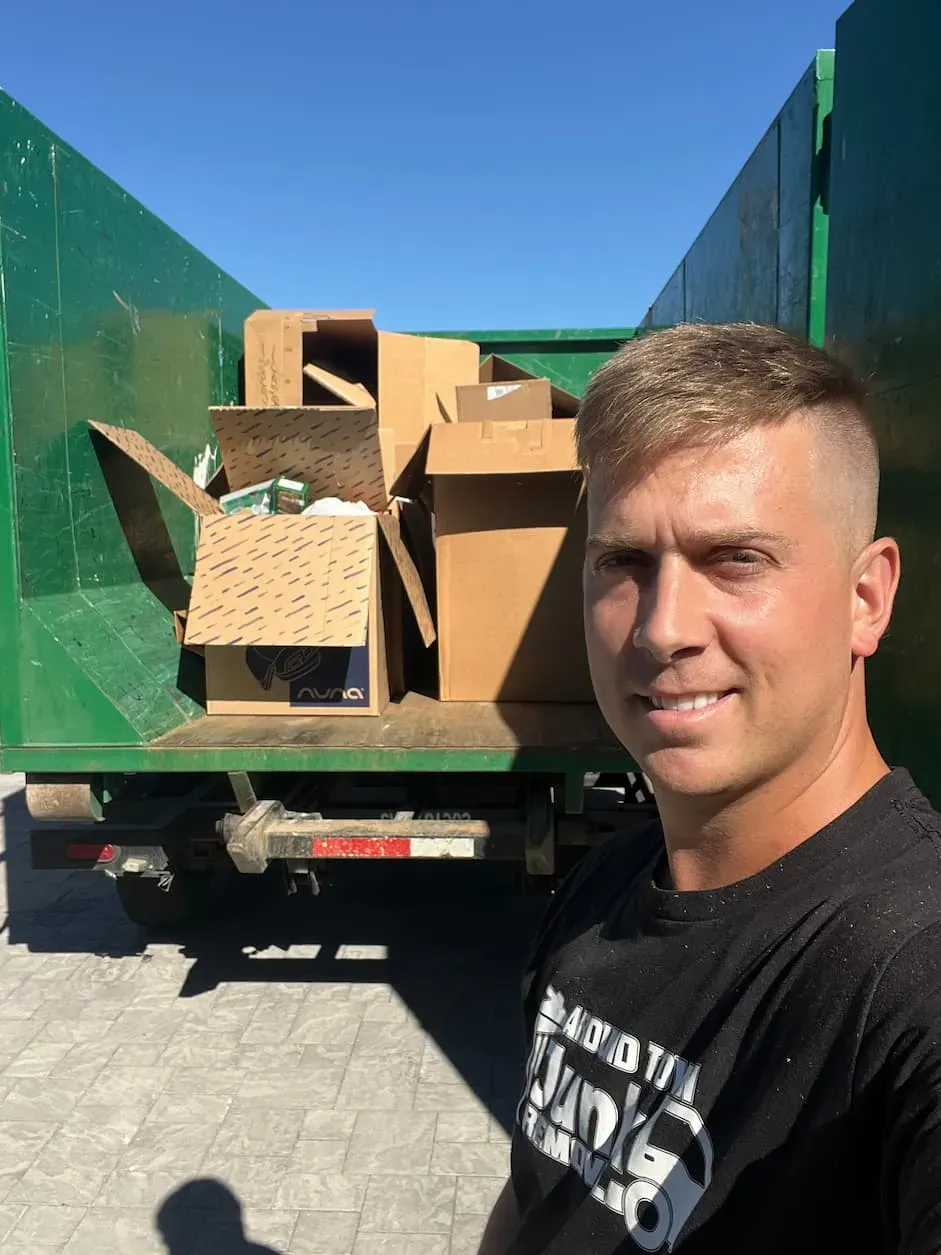 A truck loaded with flattened cardboard outside an Arcadia home