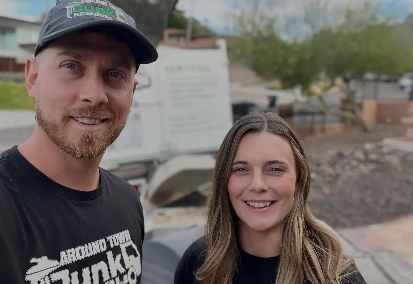 Garrett and Megan Frix with the truck on a Sweetwater Ranch patio-furniture pickup