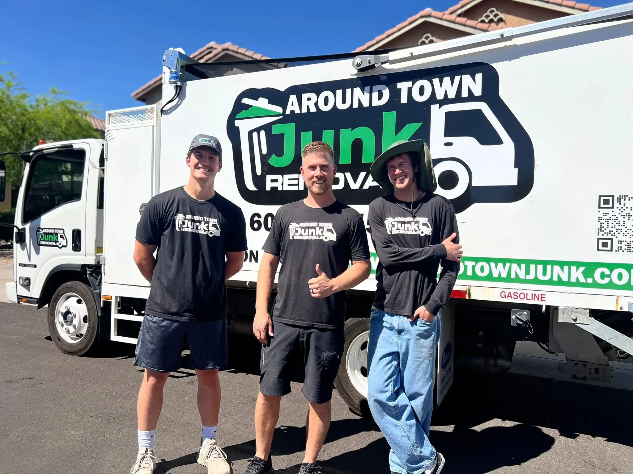 The Around Town crew standing in front of their truck